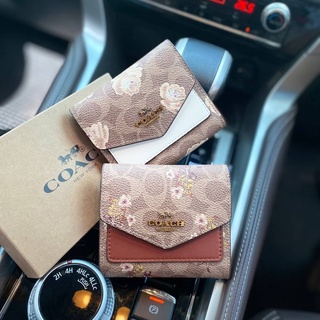 กระเป๋าสตางค์ใบสั้น COACH SMALL WALLET  IN SINATURE CANVAS WITH FLORAL BOW PRINT