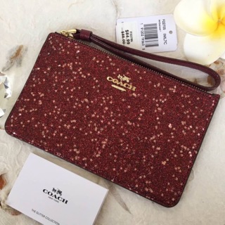 COACH SMALL WRISTLET WITH GLITTER STAR PRINT