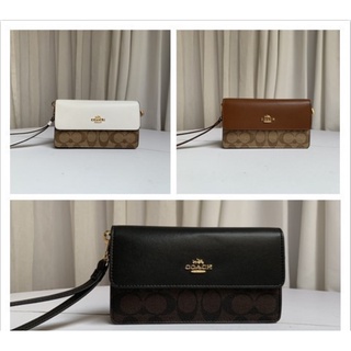 พร้อมส่ง แท้ 🇺🇸100% New Coach กระเป๋าสตางค์ รุ่น FOLDOVER WRISTLET IN SIGNATURE CANVAS #(COACH F78229)