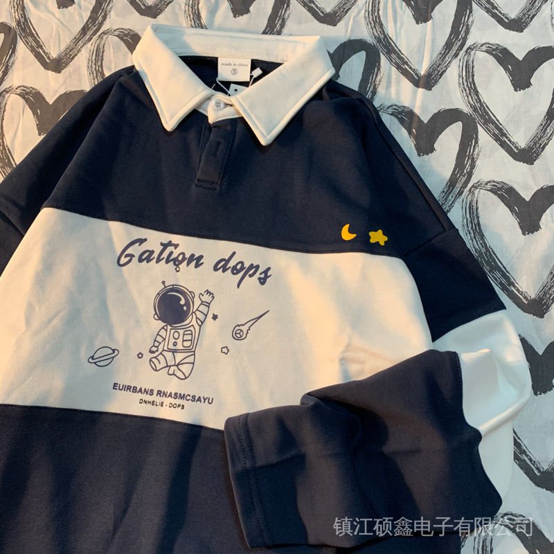 เสื้อแขนยาวเสื้อโปโลย้อนยุคอเมริกันนักบินอวกาศปกป้องผู้หญิงฤดูใบไม้ร่วงใหม่สไตล์อินซ์ชื้นป้ายเสื้อคู่รักหลวมขนาดใหญ่