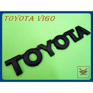 TOYOTA VIGO LOGO EMBLEM "BLACK" STICKER (size 15x2.5 cm.) // โลโก้ สติ๊กเกอร์ ข้อความ TOYOTA สีดำ พร้อมกาวติด