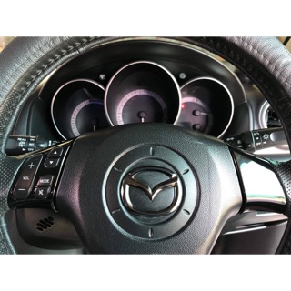 Mazda3 2004-2011(BK) ครอบโลโก้พวงมาลัยสีดำไทเทเนี่ยม/เคฟล่า/แดง