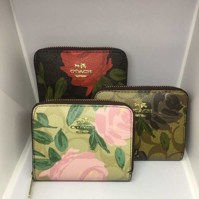 กระเป๋าสตางค์ซิปรอบ Coach