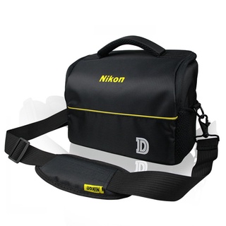 แหล่งขายและราคาQIAOYUE  พร้อมส่ง คลาสสิกกล้องกระเป๋ากล้อง กระเป๋าเก็บกล้อง กระเป๋ากล้อง Classic Nikon Camera DSLR Shoulder Bagอาจถูกใจคุณ