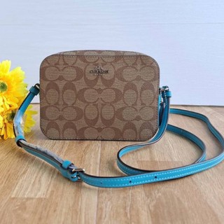 (ผ่อน0%) กระเป๋า สะพายข้าง Coach รุ่น MINI CAMERA BAG IN SIGNATURE CANVAS (COACH 91677) ลายซี สีน้ำตาล สายสีฟ้า