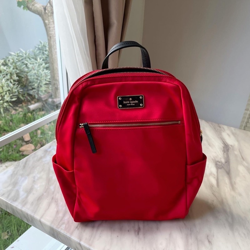 (ผ่อน0%) กระเป๋าเป้ Kate Spade New York Hilo Backpack wkru3525 ไนล่อน สีแดง