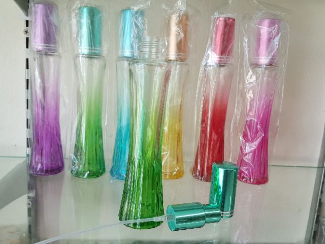 ขวดสเปรย์แก้วรูปกระโปรง 50 ML ใบละ 20 บาทมีหลายสี