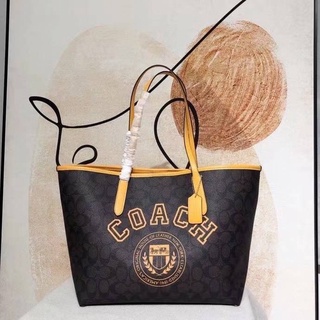 Coach cb869 City tote in signature canvas with varsity motif