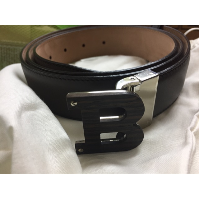 เข็มขัด bally แท้ ป้ายกล่องครบ ลด 40% เข็มขัดหนังสีน้ำตาลเข้ม หัวเข็มขัดทำจากไม้ขัดเงา ขนาด 42นิ้ว ไ