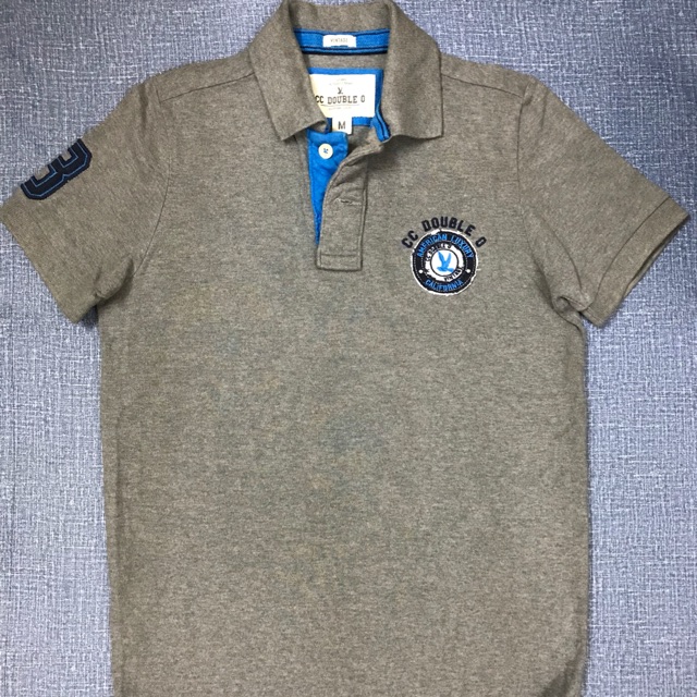 Code ลด 100฿ : CC double O เสื้อโปโล มือ 1