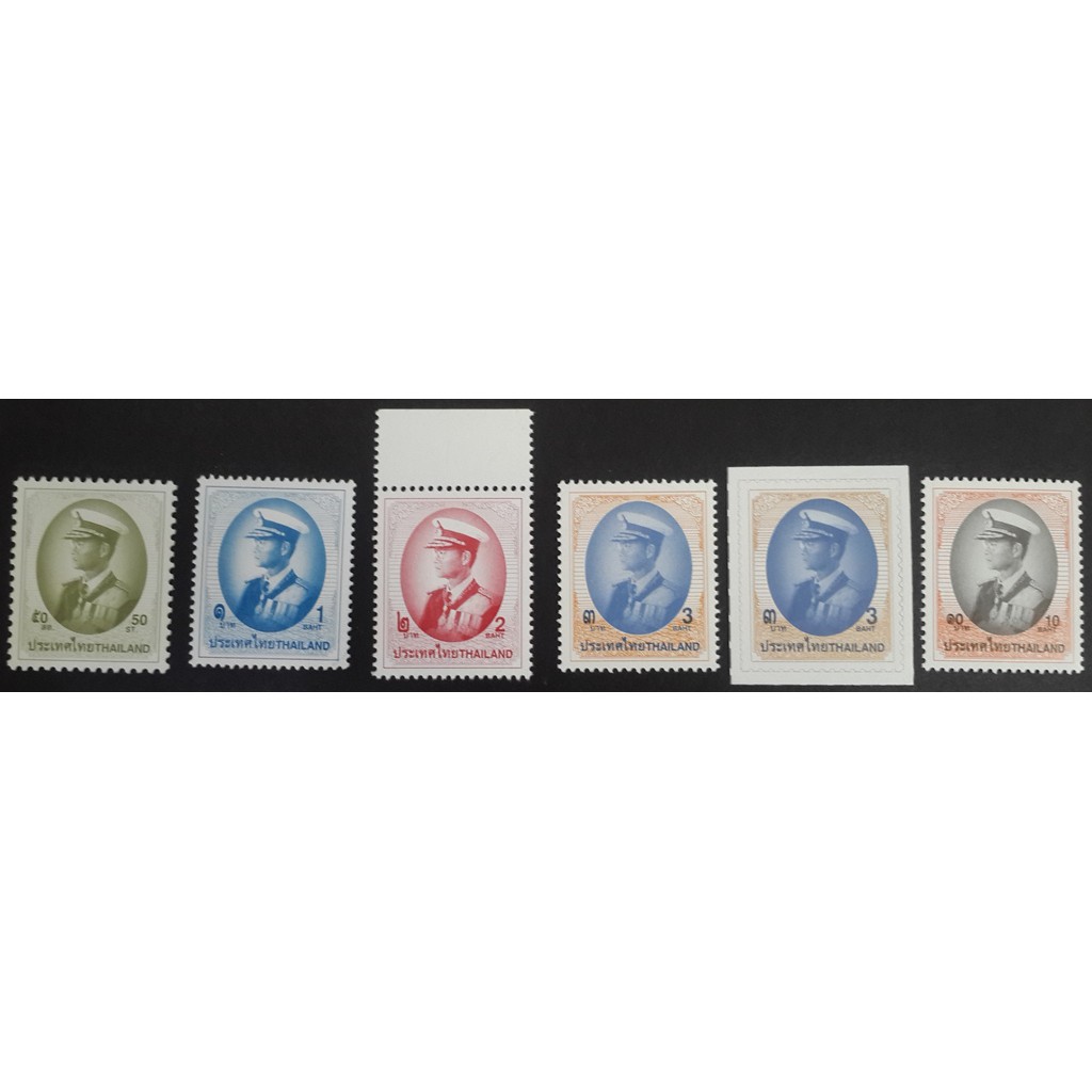 B75 แสตมป์ไทยยังไม่ได้ใช้ แสตมป์พระรูป ร.9 ชุดที่ 9 ดวงราคา 0.50,1,2,3,10 บาท และ 3 บาทสติ๊กเกอร์ รว