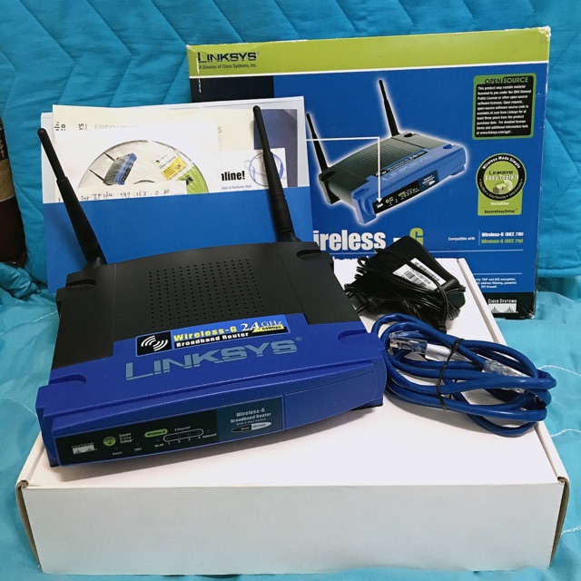 อุปกรณ์ครบชุด มือ 1 Linksys WRT54GL Wireless Broadband Router ย่านความถี่ 2.4GHz ความเร็ว 54Mbps พร้