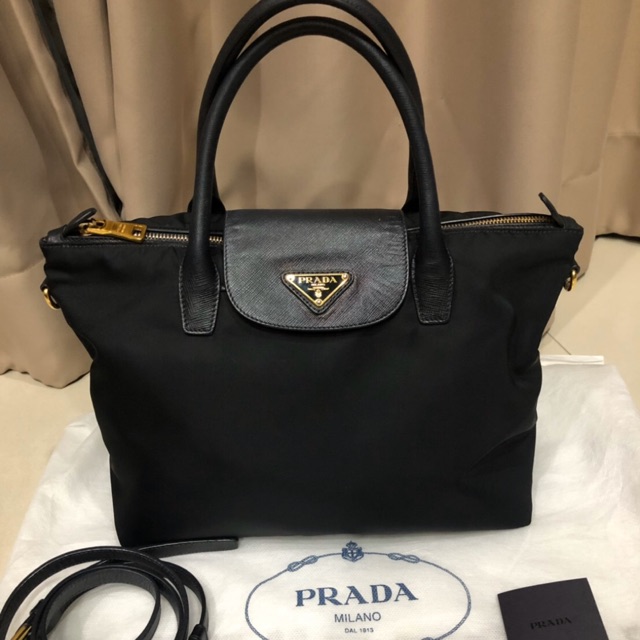 Used in good condition Prada Tessuto Nero  color