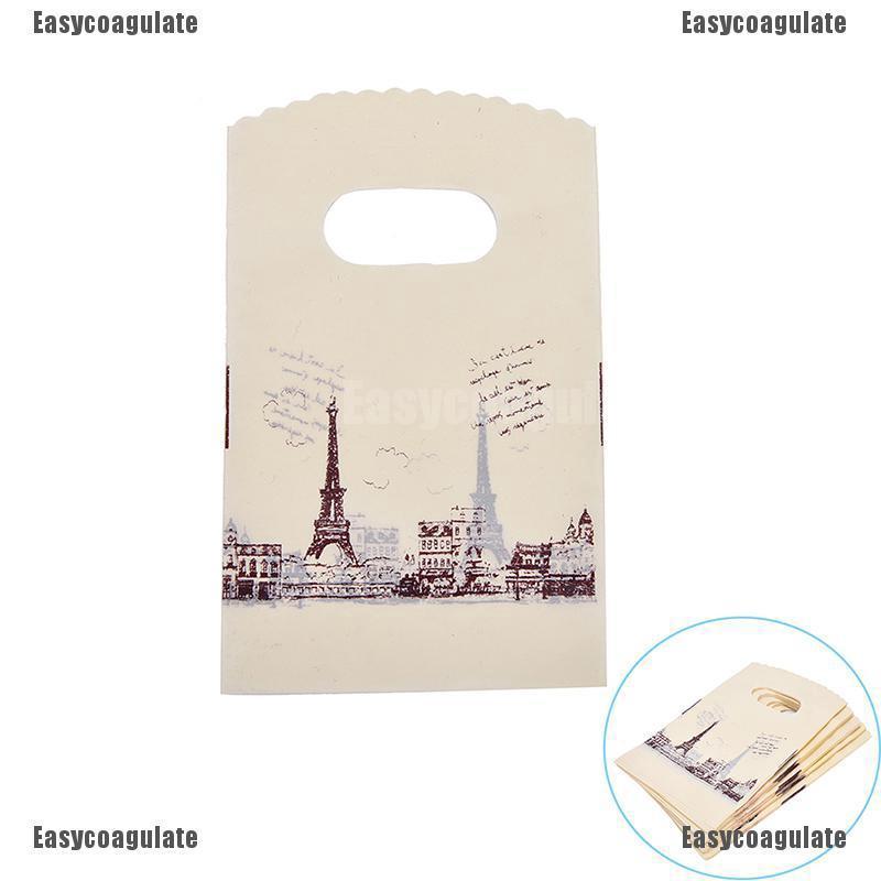 EasyCoagulate 100pcs/lot Pink Eiffel Tower Packaging Bags Plastic Shopping Bags With Handle,