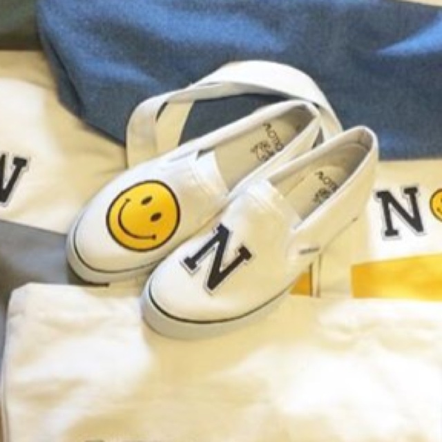 Smiley slip shoes on