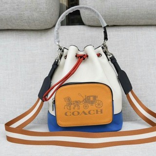 Coach แท้💯outletJES DRAWSTRING BUCKET BAG IN COLORBLOCK WITH HORSE AND CARRIAGE (COACH 1899)