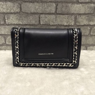 charles and keith chain detail clutch