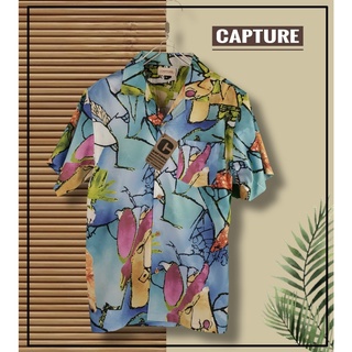 เสื้อเชิ้ตฮาวาย แนวเดอะทอย ลายกราฟฟิค สีฟ้า มีถึง อก 48นิ้ว