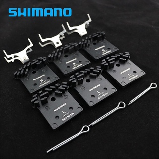 Shimano ผ้าเบรกคาลิปเปอร์ไฮดรอลิค สําหรับรถจักรยาน M6000 M7000 M8000 M9000 M675 M785 M987 M615