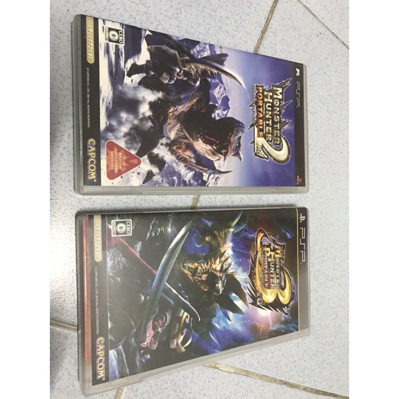 ขายเหมาเกมส์ PSP 2 แผ่นมือสองจากญี่ปุ่น เกม Monster Hunter Portable ภาค 2 และภาค 3 คู่มือครบ เล่มหนา น่าเล่นน่าสะสม