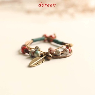 Doreen สร้อยข้อมือเซรามิก สีบรอนซ์ ปรับได้ คุณภาพสูง สําหรับผู้หญิง 1 ชิ้น