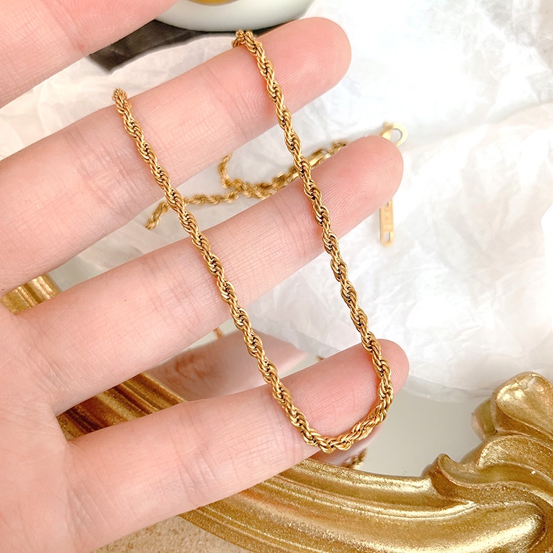 สร้อยข้อมือโซ่ สเตนเลส แบบบิด แบบบาง