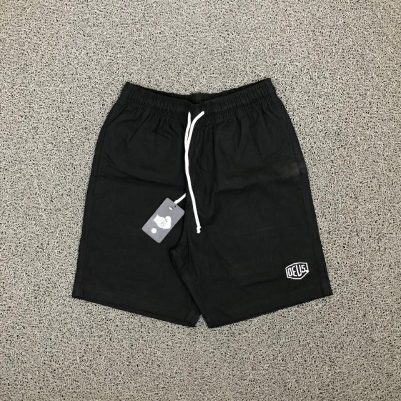 กางเกงขาสั้นลําลอง Deus ex Machina | บ็อกเซอร์ลําลอง Deus ex Machina Logo