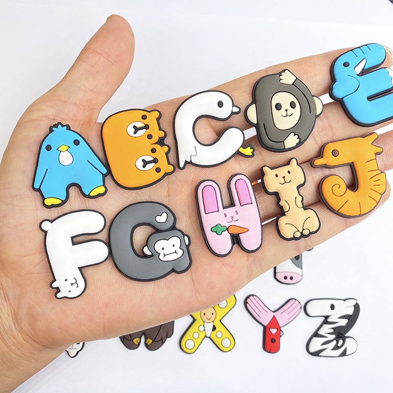 จระเข้ DIY น่ารักที่สร้างสรรค์#jibbitz Animal Pins Crocs Shoe Charms Letter AZ การ์ตูน ดอกไม้ rainbow 1-12 อุปกรณ์ตกแต่ง สําหรับรองเท้าและกระเป๋า