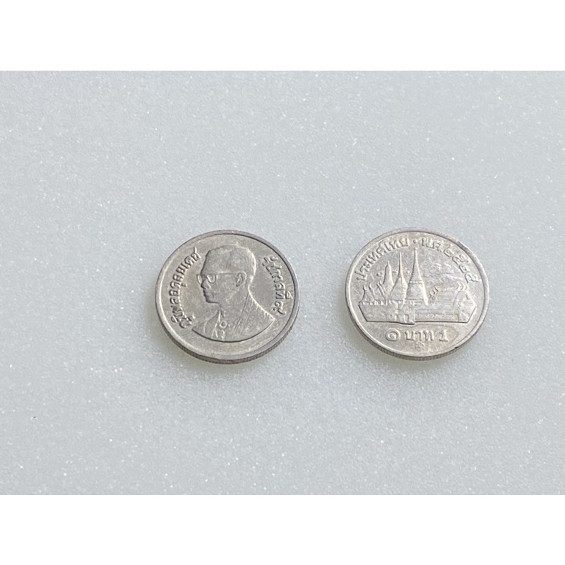 เหรียญ 1 บาท หลังวัดพระแก้วปี 2525 ผ่านการใช้
