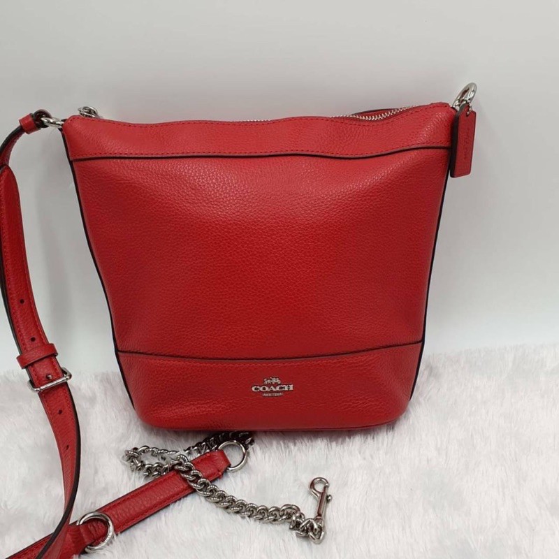 (ผ่อน0%) กระเป๋าสะพายข้าง SMALL PAXTON DUFFLE (COACH F76668) BRIGHT CARDINAL/SILVER หนังแท้ สีแดง