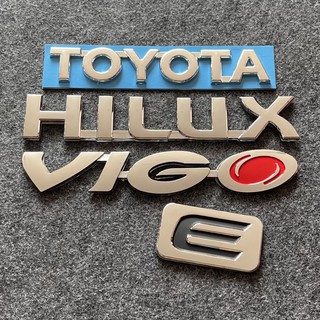 โลโก้ TOYOTA HILUX VIGO E ตัวหนังสือฝาท้าย (จำนวน 4 ชิ้น)