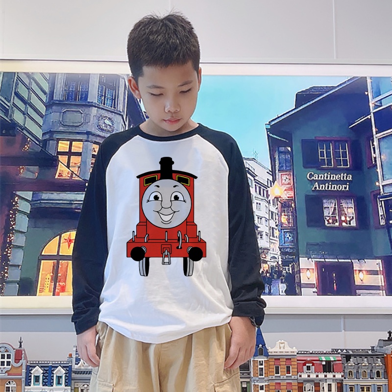เสื้อยืดแขนยาว ผ้าฝ้าย พิมพ์ลายการ์ตูนไดโนเสาร์ แฟชั่นฤดูใบไม้ร่วง สําหรับเด็กผู้หญิง และเด็กผู้ชาย อายุ 1-10 ปี