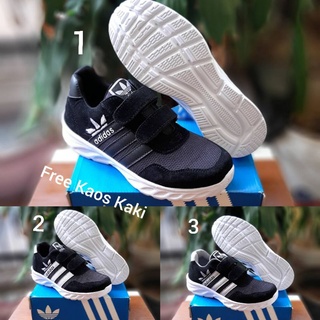 Adidas REV SIZE 30-37 รองเท้าผ้าใบ สีดํา สีขาว สําหรับเด็ก