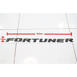 ป้ายโลโก้TOYOTA FORTUNER พลาสติกสีดำด้าน ขนาด36.5x2.3cm ติดตั้งด้วยเทปกาวสองหน้า