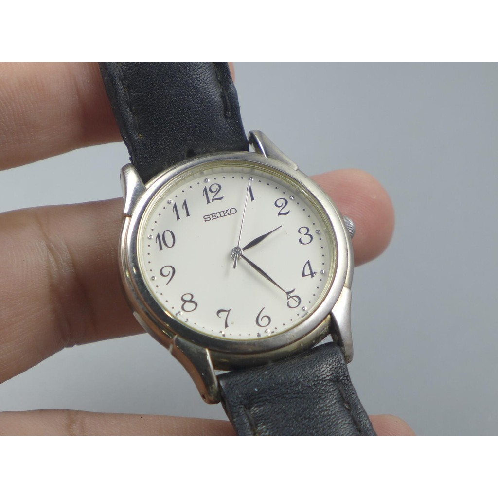 นาฬิกา Vintage มือสองญี่ปุ่น Seiko 7N01 7140 หน้าปัดสีขาว ผู้ชาย Quartz ทรงกลม 35mm