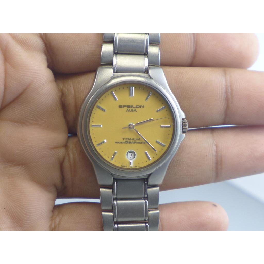 นาฬิกา Vintage มือสองญี่ปุ่น ALBA EPSILON V732 0100 QUARTZ ผู้ชาย ทรงกลม กรอบเงิน หน้าเหลือง สายTita