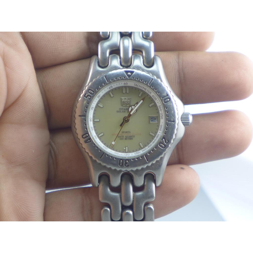 นาฬิกา Vintage มือสองญี่ปุ่น ELGIN USA TITANIUM SOLAR DRIVE QUARTZ ผู้ชาย หน้าปัดหมุนได้ หน้าเหลือง 