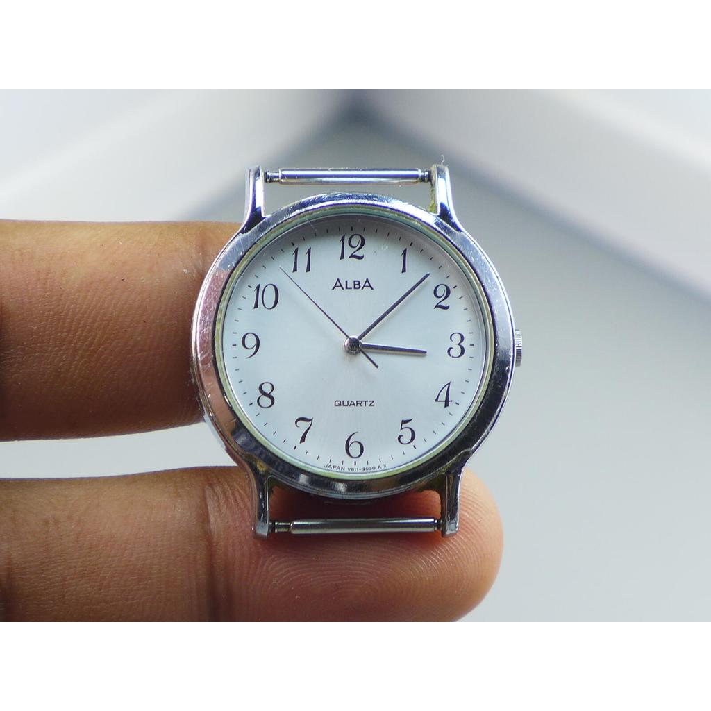 นาฬิกา Vintage มือสองญี่ปุ่น ALBA V811 0770QUARTZ ผู้ชาย ทรงกลม กรอบเงิน หน้าขาว ไม่มีสาย  29mm