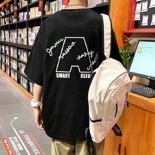 เสื้อยืดแขนสั้น คอกลม พิมพ์ลายตัวอักษร ทรงหลวม ขนาดใหญ่ สวมใส่สบาย แฟชั่นฤดูร้อน สไตล์เกาหลี สําหรับผู้ชาย และผู้หญิง【M-5XL】