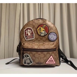 Coach F88016 กระเป๋าเป้สะพายหลัง Star Wars Medium Charlie ในผ้าใบลายเซ็นพร้อม Patches Women Bag