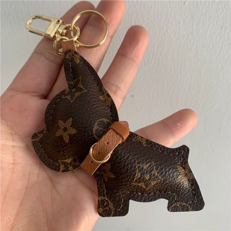 ﹍ ✻ พวงกุญแจรถ LVพวงกุญแจ✎○❐LV & GEDETE Puppy Dog Fighting Presbyopia จี้พวงกุญแจรถจี้ของขวัญ