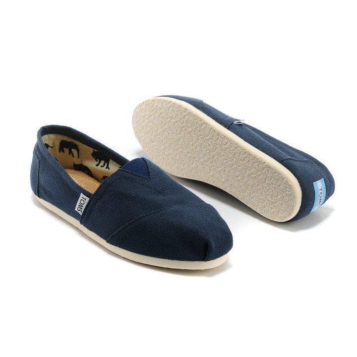 Toms รองเท้าผ้าใบลําลอง ส้นแบน ลายทาง สีฟ้า สําหรับผู้ชาย ผู้หญิง