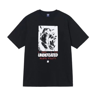 เสื้อยืดแขนสั้นลําลอง ทรงหลวม พิมพ์ลายหัวสุนัขห้าแฉก undefeated สําหรับผู้ชาย และผู้หญิง