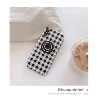 เคสสีดำลายตาราง พร้อมกับขาตั้งรูปยิ้ม