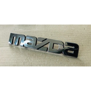 โลโก้ mazda ติดกระจังขนาด 14x2.5 cm