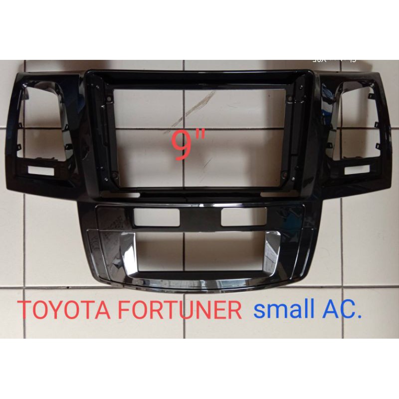 หน้ากากวิทยุ TOYOTA FORTUNER ปี2010-2014สำหรับจอ android9"(แบบช่องควบตุมแอร์รูเด็ก)