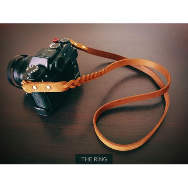 สายคล้องกล้องหนังแท้💯% แต่งลายถักด้านข้าง