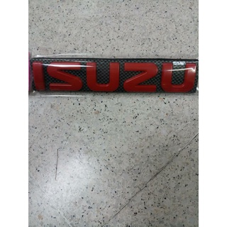 โลโก้ติดกระจังหน้า D-MAX 2003-2006 พื้นเคฟล่า ขนาด 17.5×3.5 cm