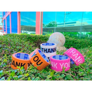 เทปพิมพ์โลโก้  Thank You  สีพื้นชมพู,พื้นขาว,พื้นส้มอิฐ กว้าง 48 มิล ยาว 45 หลา  1 ม้วน