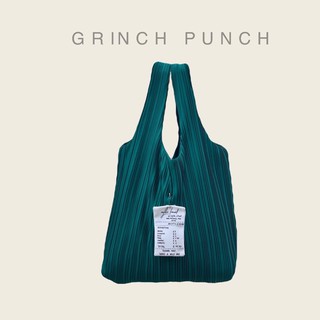 Wyllabrand กระเป๋าผ้าพลีท Grinch punch